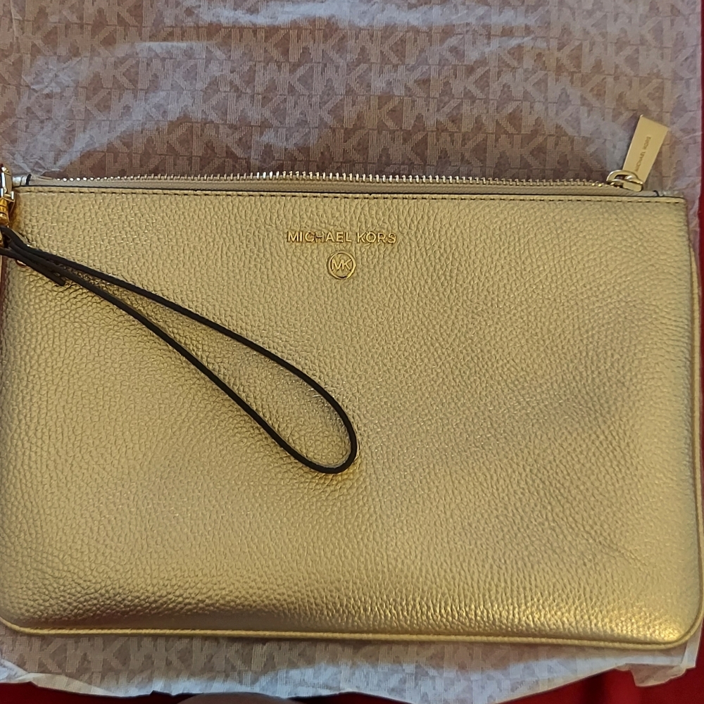 Michael Kors Clutch / Wristlet in Pale Gold leather measurements W 10 1/4  6 1/2